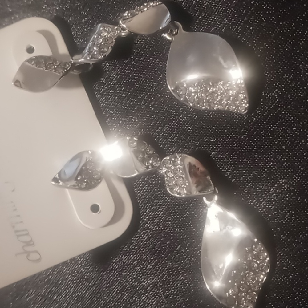 Charming Charlie dangling earrings silver with pave crystals.
